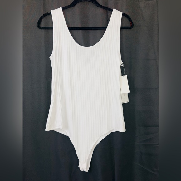1. State - Ultra White Ribbed Scoop Neck Thong Bodysuit Large   New with… - Picture 1 of 8